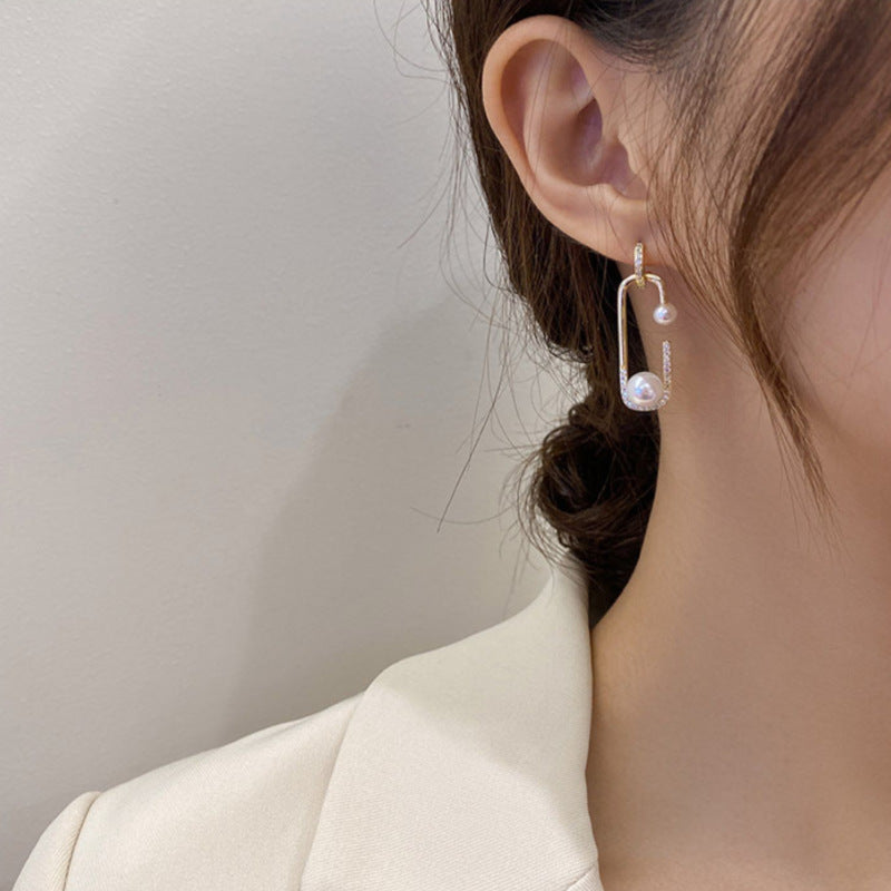 Stud JOLYA Earrings With Diamond.